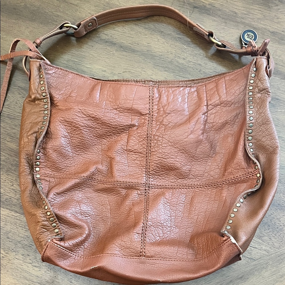 The Sak Tan Leather Hobo Bag with Stud Accents